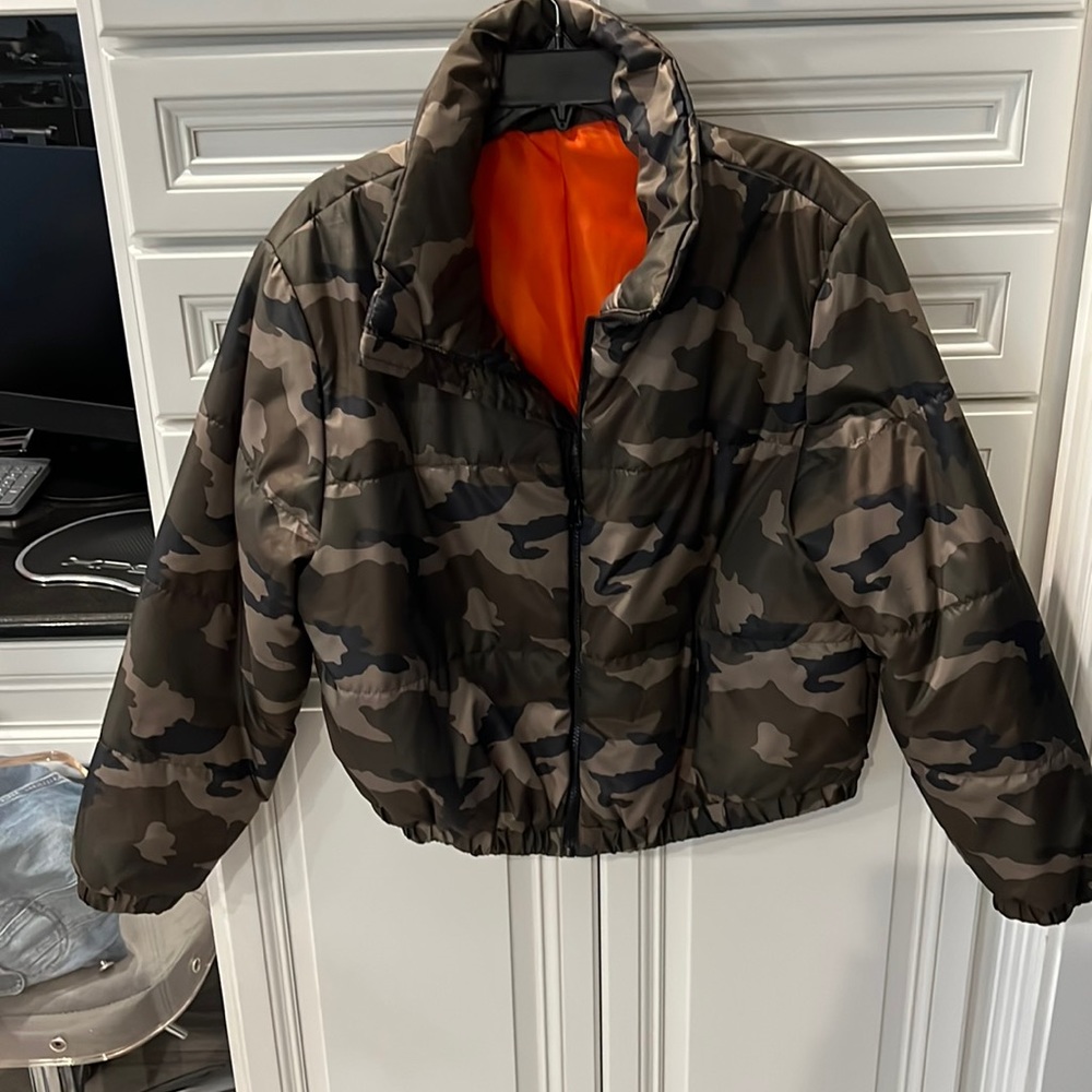 Adorable camouflage jacket in a woman’s Large